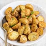 Close up of a bowl of air fried baby potatoes.