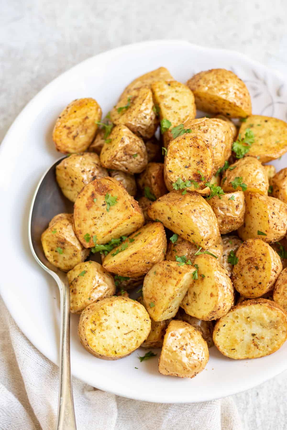 Close up of air fried baby potatoes in a bowl.