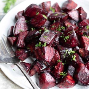Close up of a plate of roasted beets.