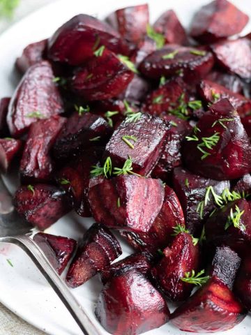 Close up of a plate of roasted beets.