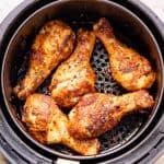 Cooked chicken legs in air fryer.
