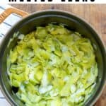 A casserole dish of leeks, with text: Easy melted leeks.
