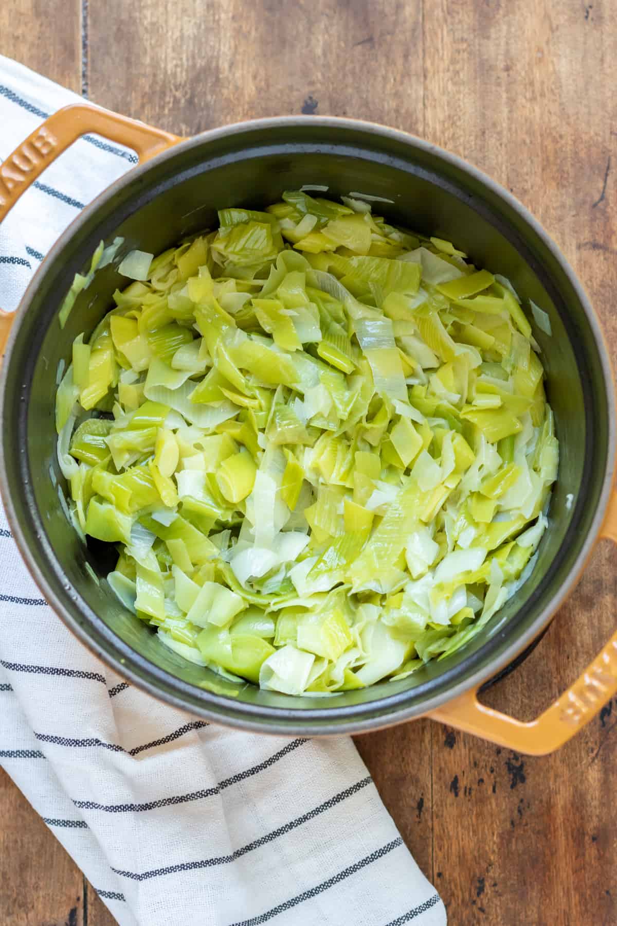 Melted leeks in a pot.