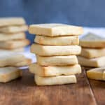 Stacks of Lorna Doone cookies on a wooden table.