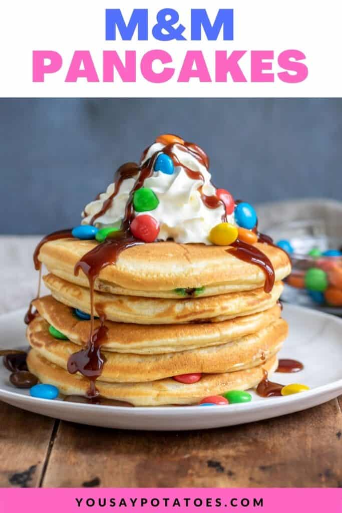 A stack of pancakes, with text: M&M Pancakes.