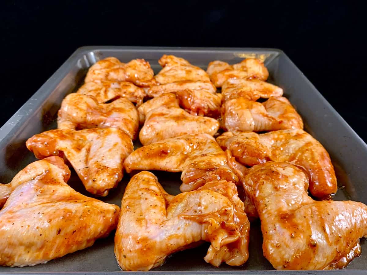 Raw wings ready to be baked.