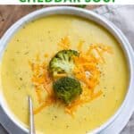 Bowl of soup, with text: Instant Pot Broccoli Cheddar Soup.
