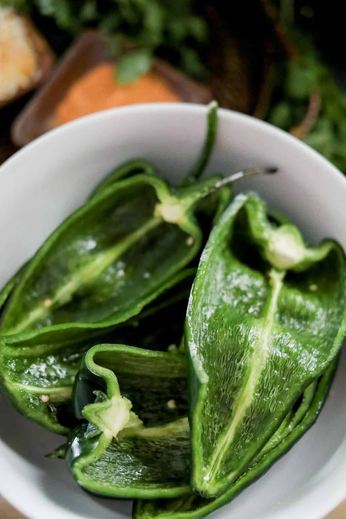 Prepping poblano peppers.