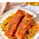Plate of salmon, with text: Air Fryer Cajun Salmon.
