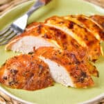 Plate with slices of turkey breast.