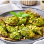 Plate of chicken, with text: Easy Pesto Chicken Bites.