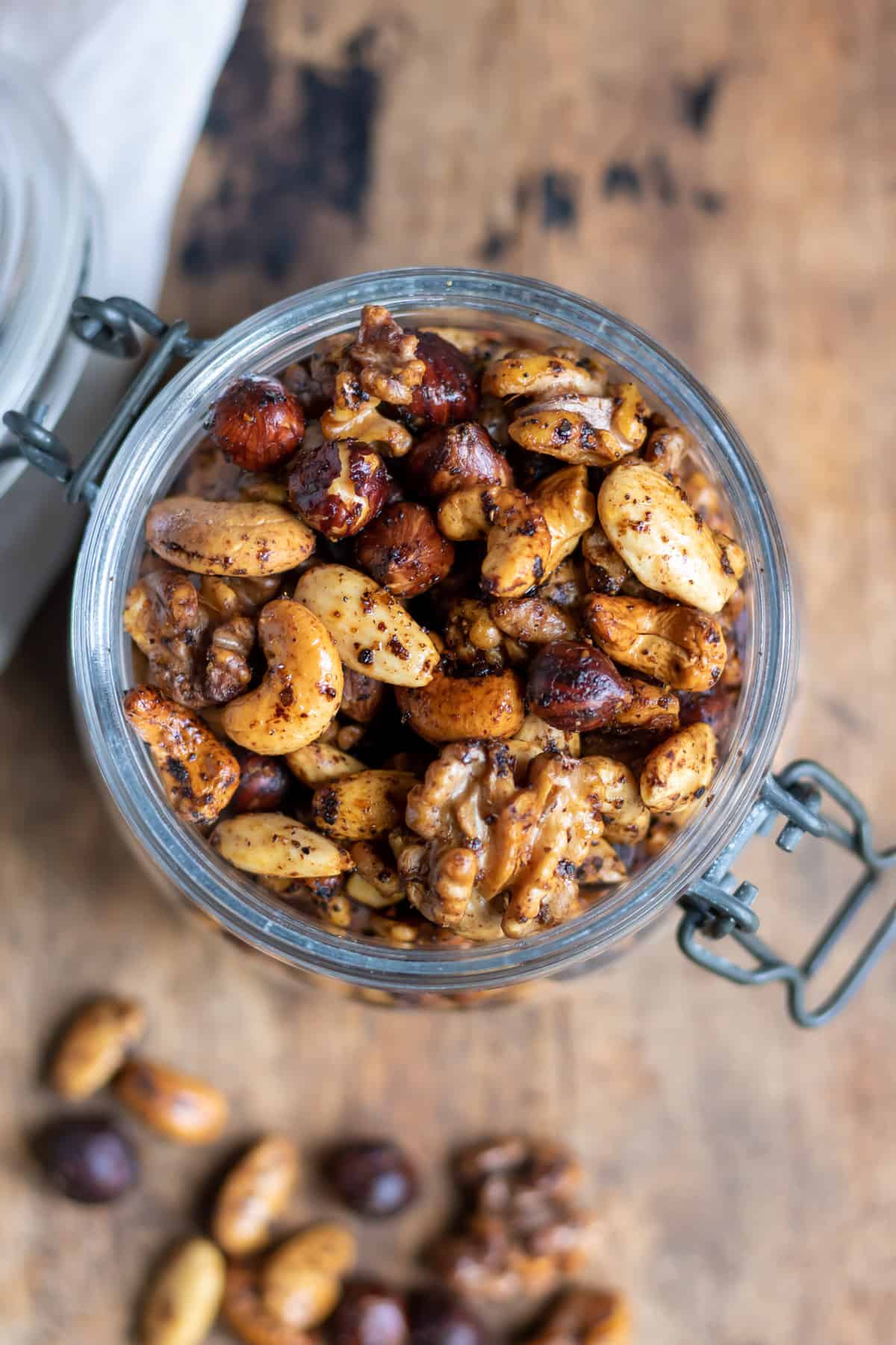 Looking down into a jar of roasted Tajin nuts.
