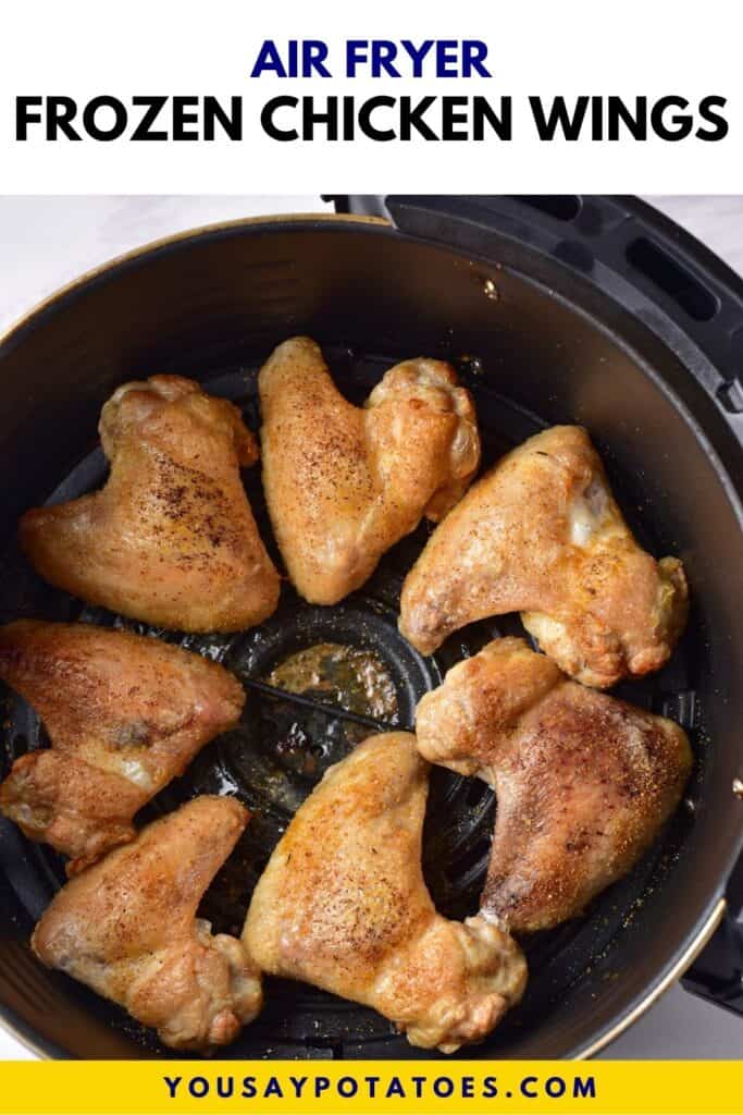 Air Fryer basket of wings, with text: Air Fryer Frozen Chicken Wings.