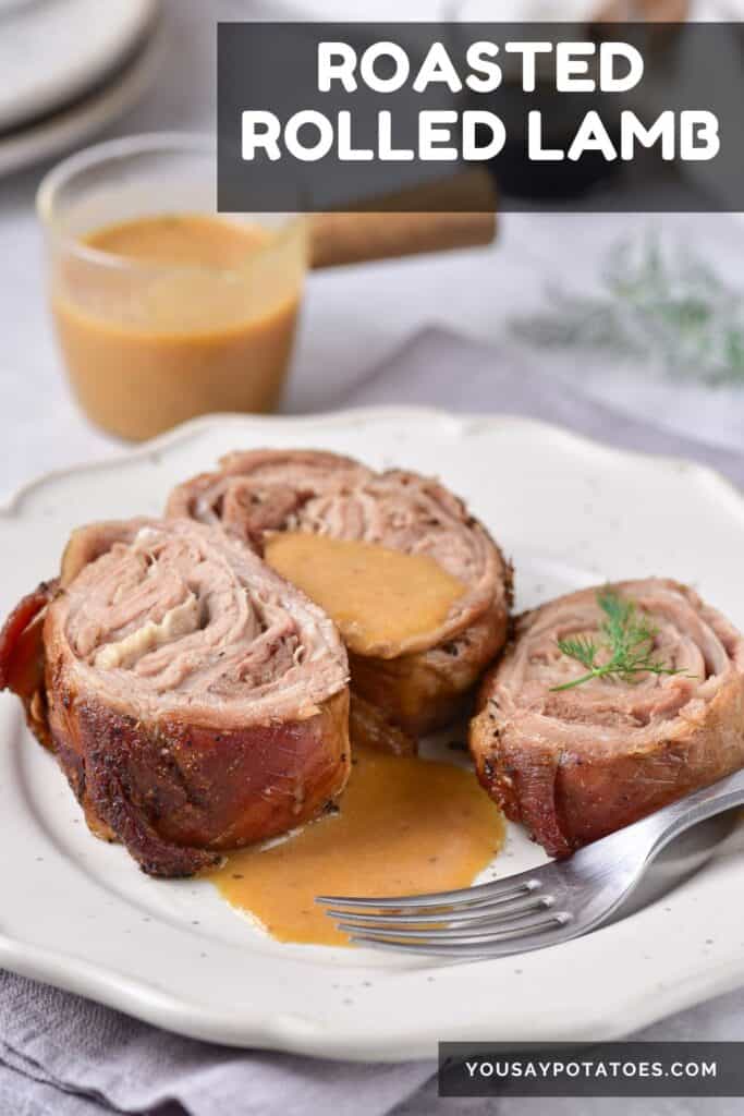 Plate of lamb with gravy, and text: Roasted Rolled Lamb.