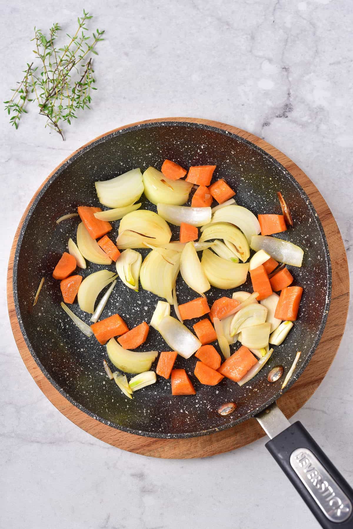 Pan frying vegetables.
