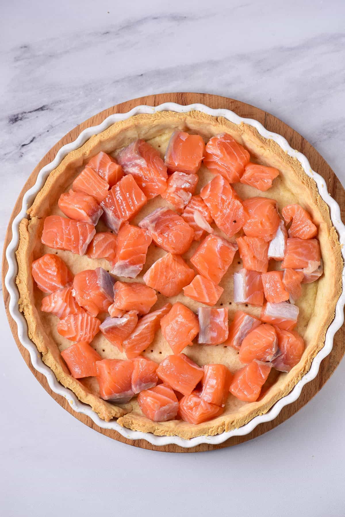 Salmon cubes added to the pastry crust.