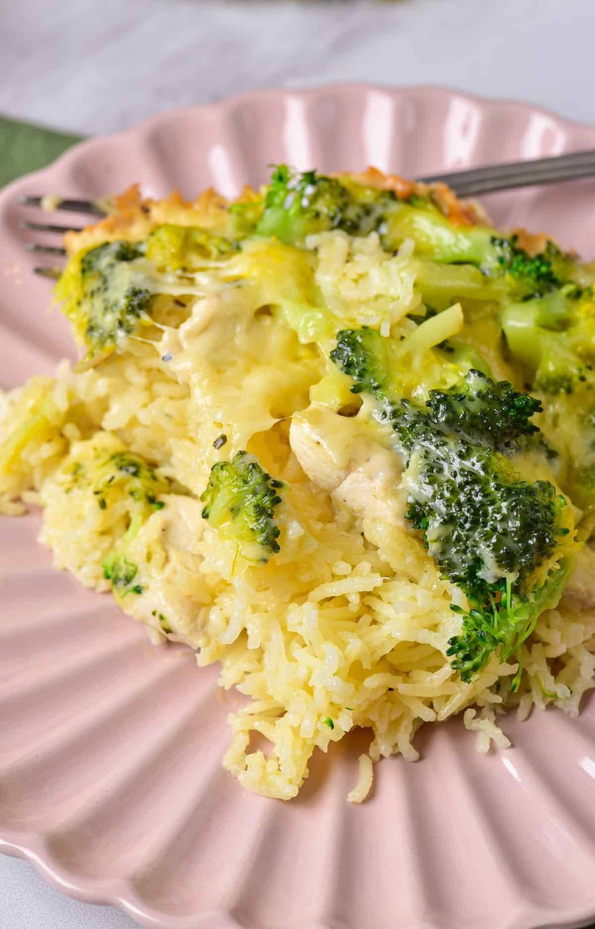 Close up of a portion of chicken broccoli rice casserole.