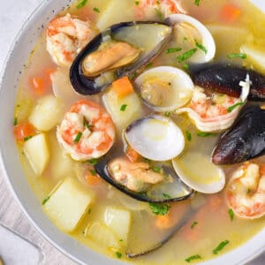 A bowl of seafood stock / broth.