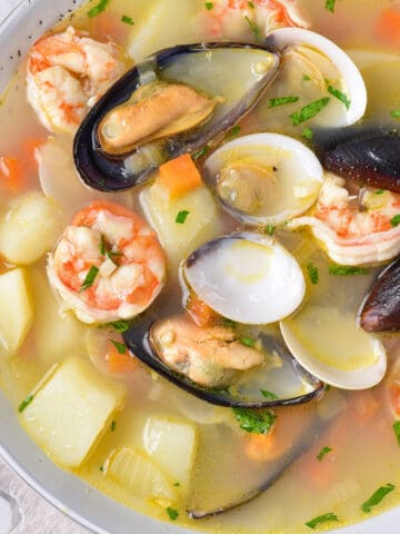 A bowl of seafood stock / broth.