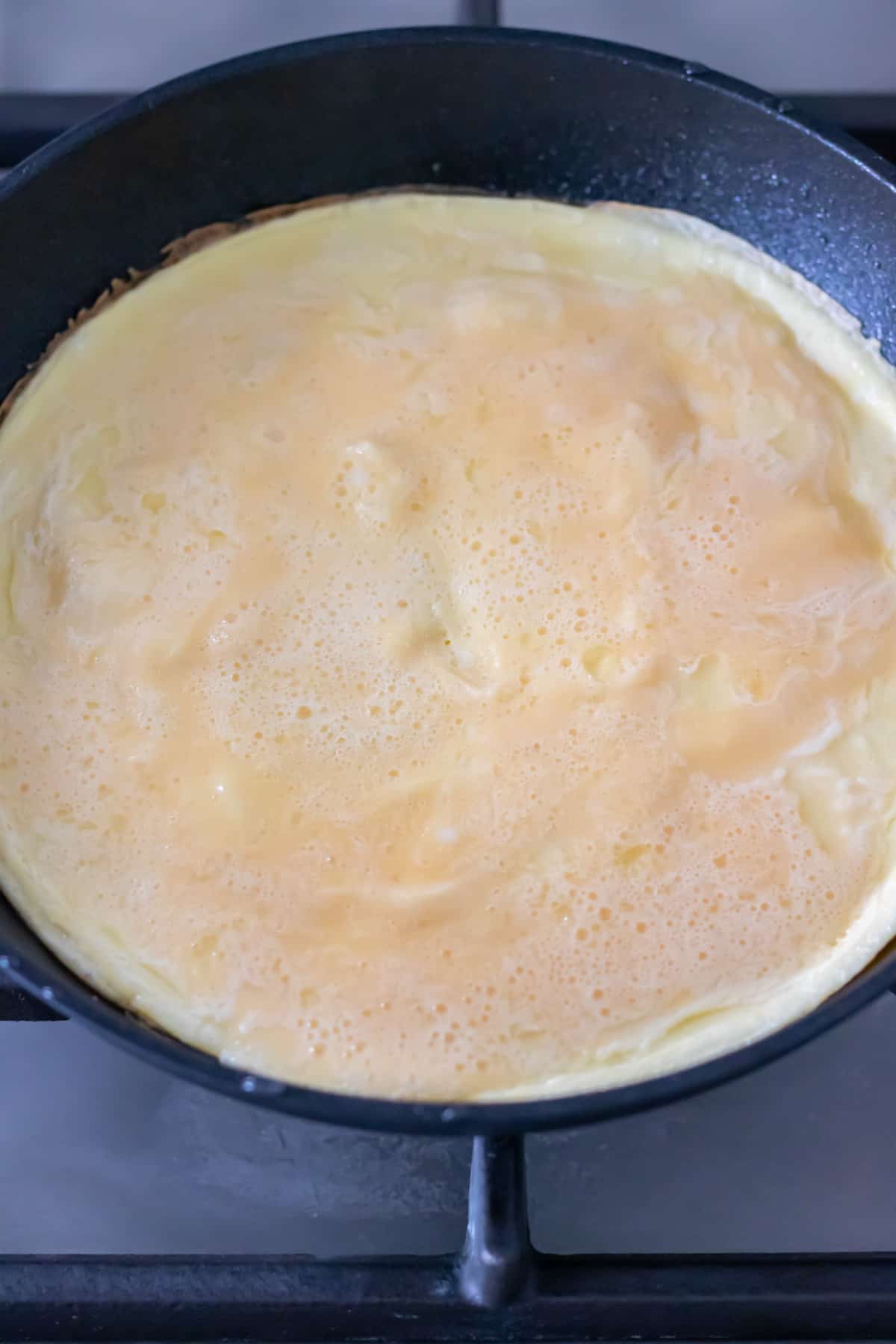 Partially cooked omelet.