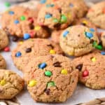 A pile of peanut butter M&M cookies.