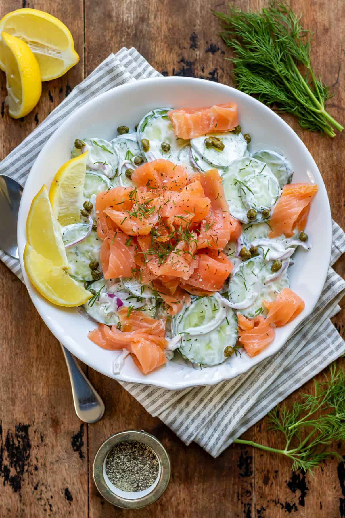 Smoked salmon salad with cucumber and dill.