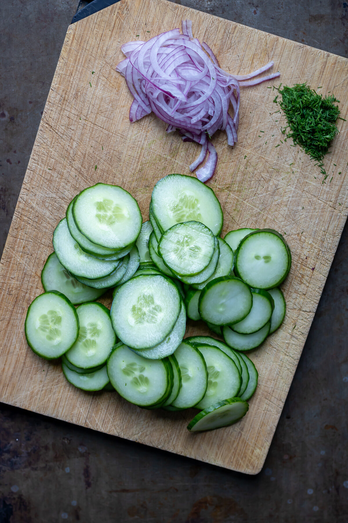 Sliced cucumber, onion and chopped dill.