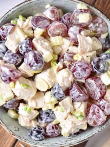Close up looking down at a bowl of grape chicken salad.