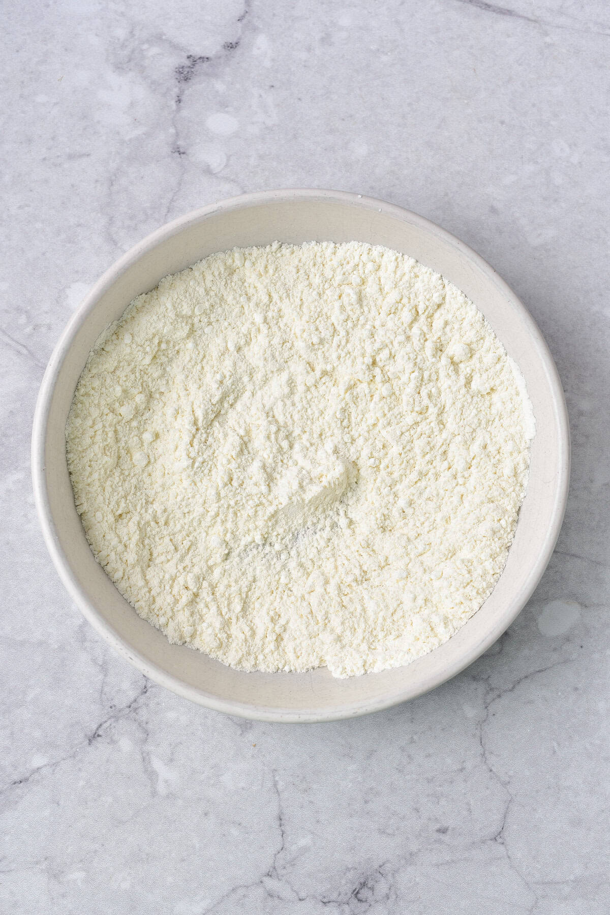 Flour in a bowl.