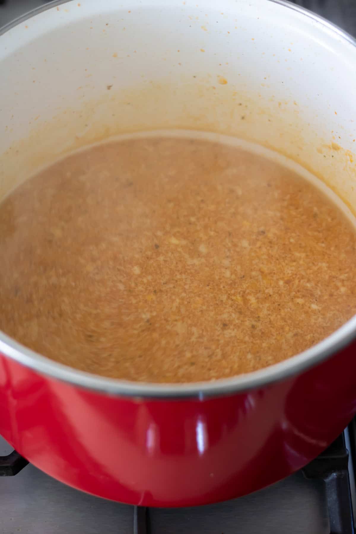 Simmering soup base.