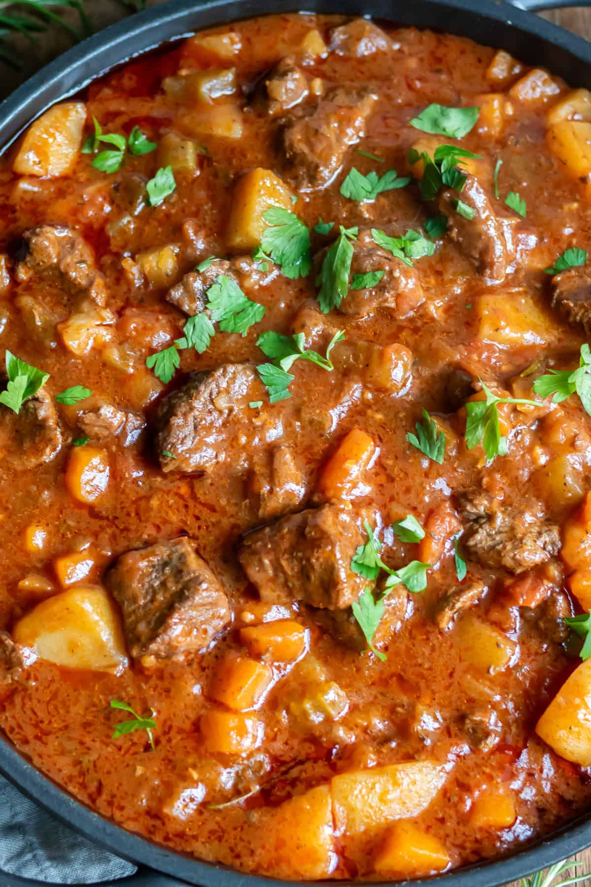 Close up of spezzatino di manzo - Italian beef stew on a table.