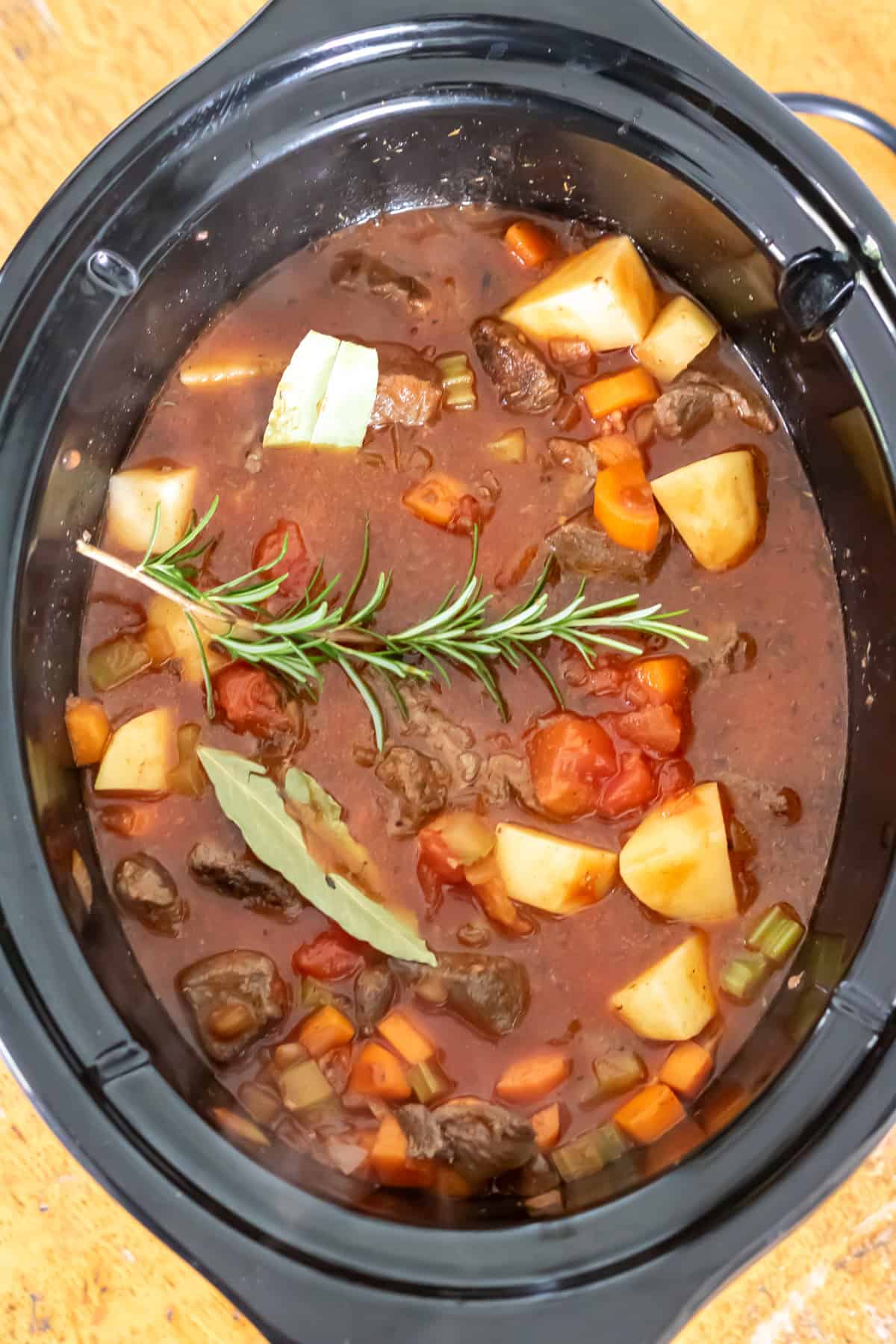 Ingredients added to the slow cooker.