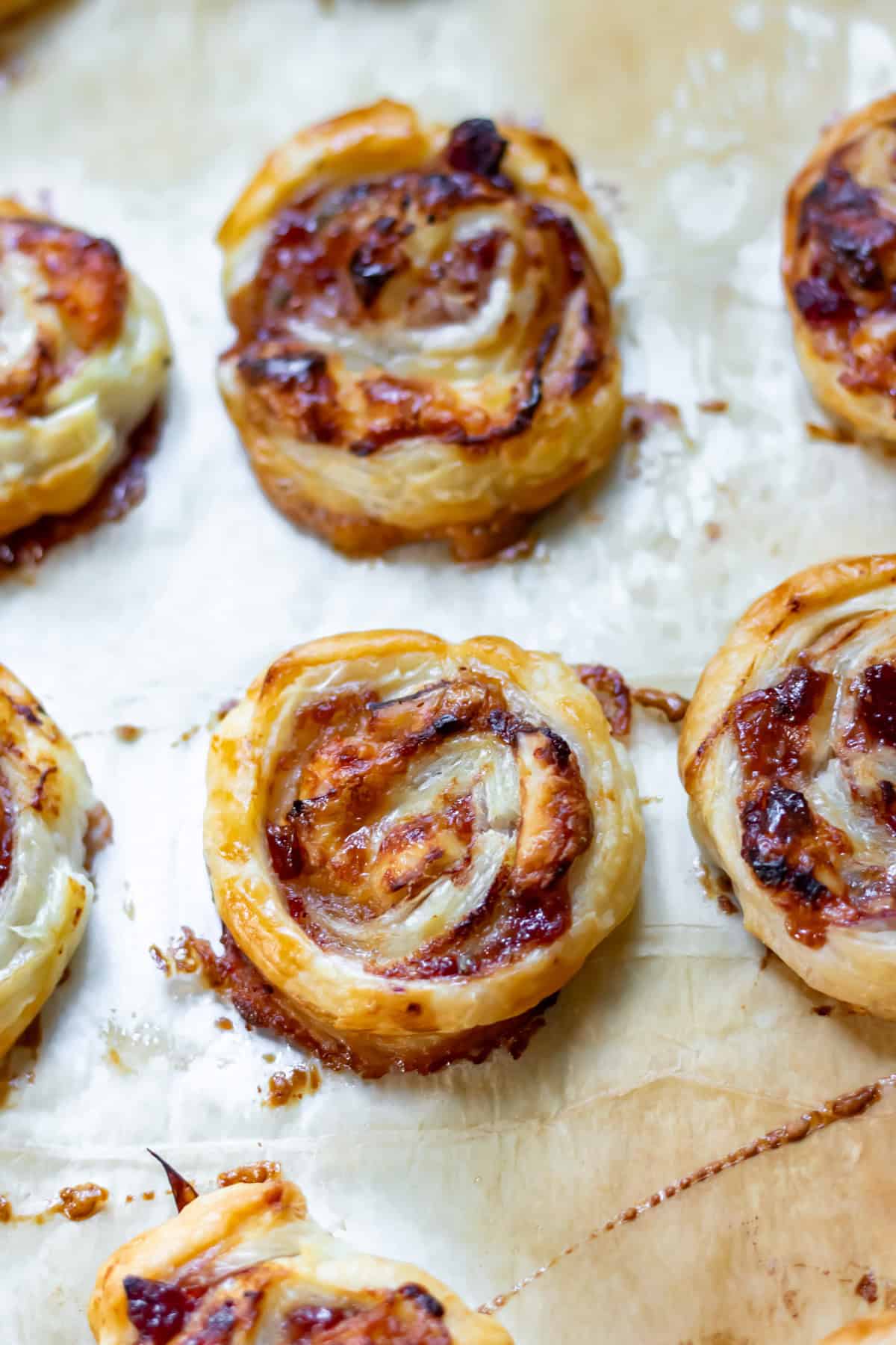 Close up of a cranberry brie pinwheel.