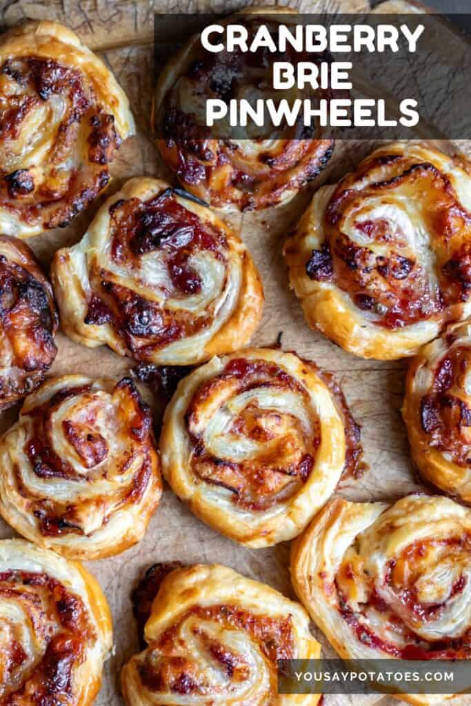 Rows of pastries with text: Cranberry Brie PInwheels.