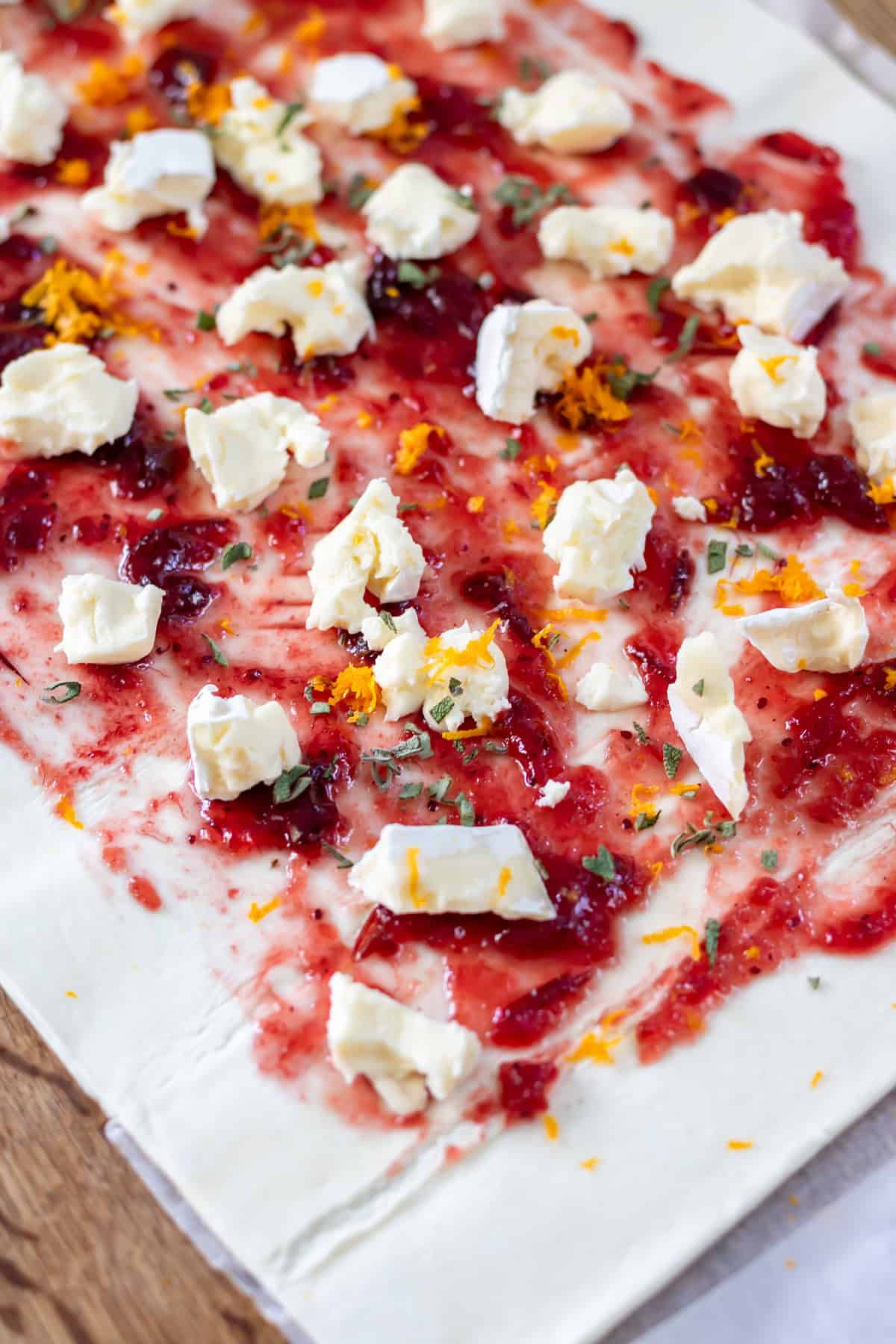 Sprinkling it with orange zest and sage.