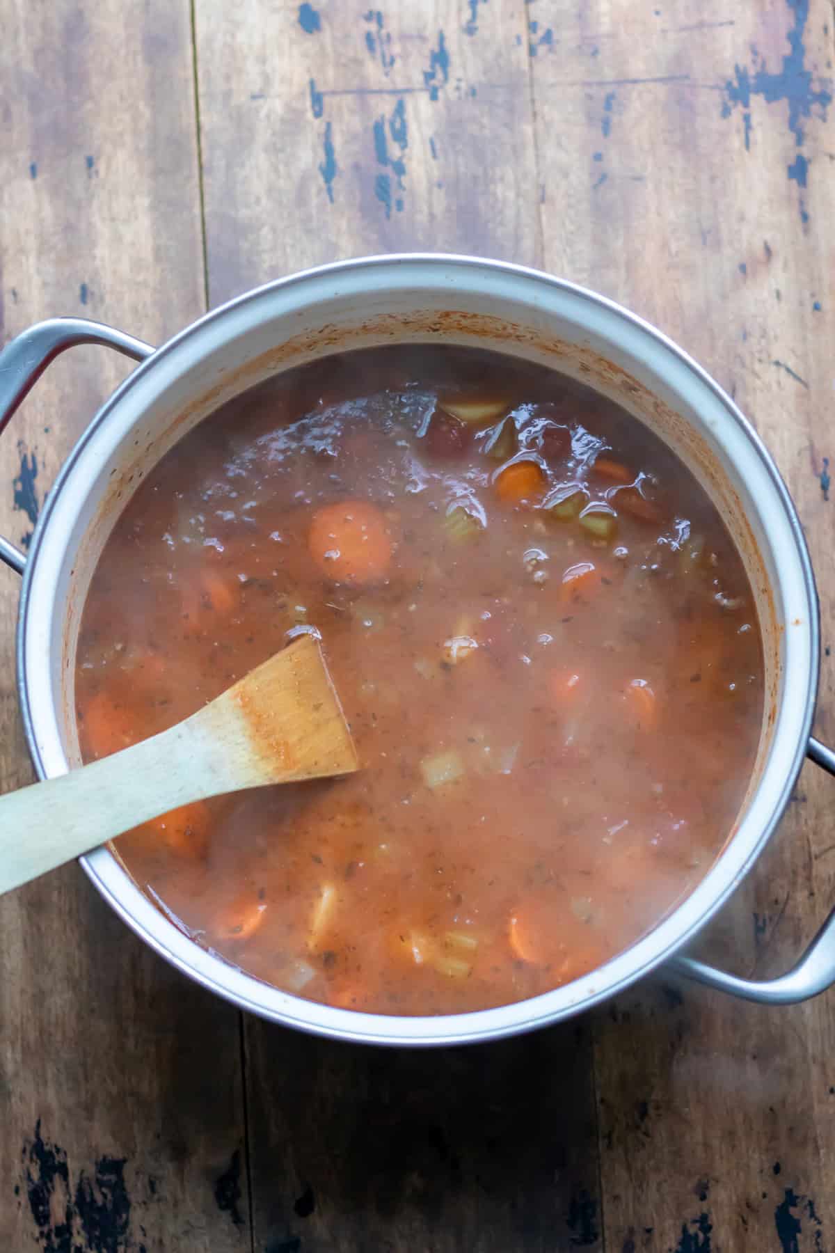 Cooking the ground beef soup.