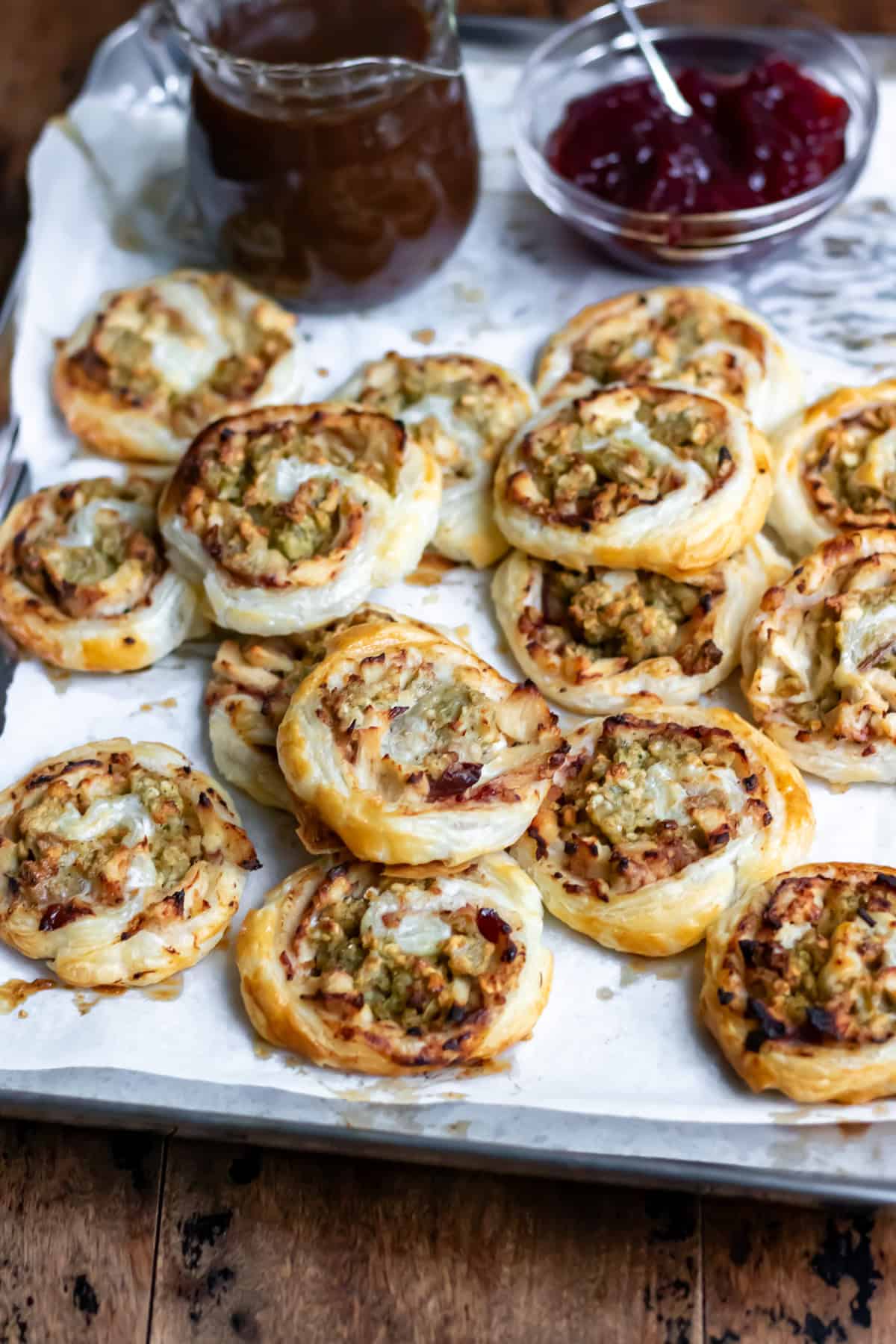 Close up of a pile of leftover turkey pinwheels.