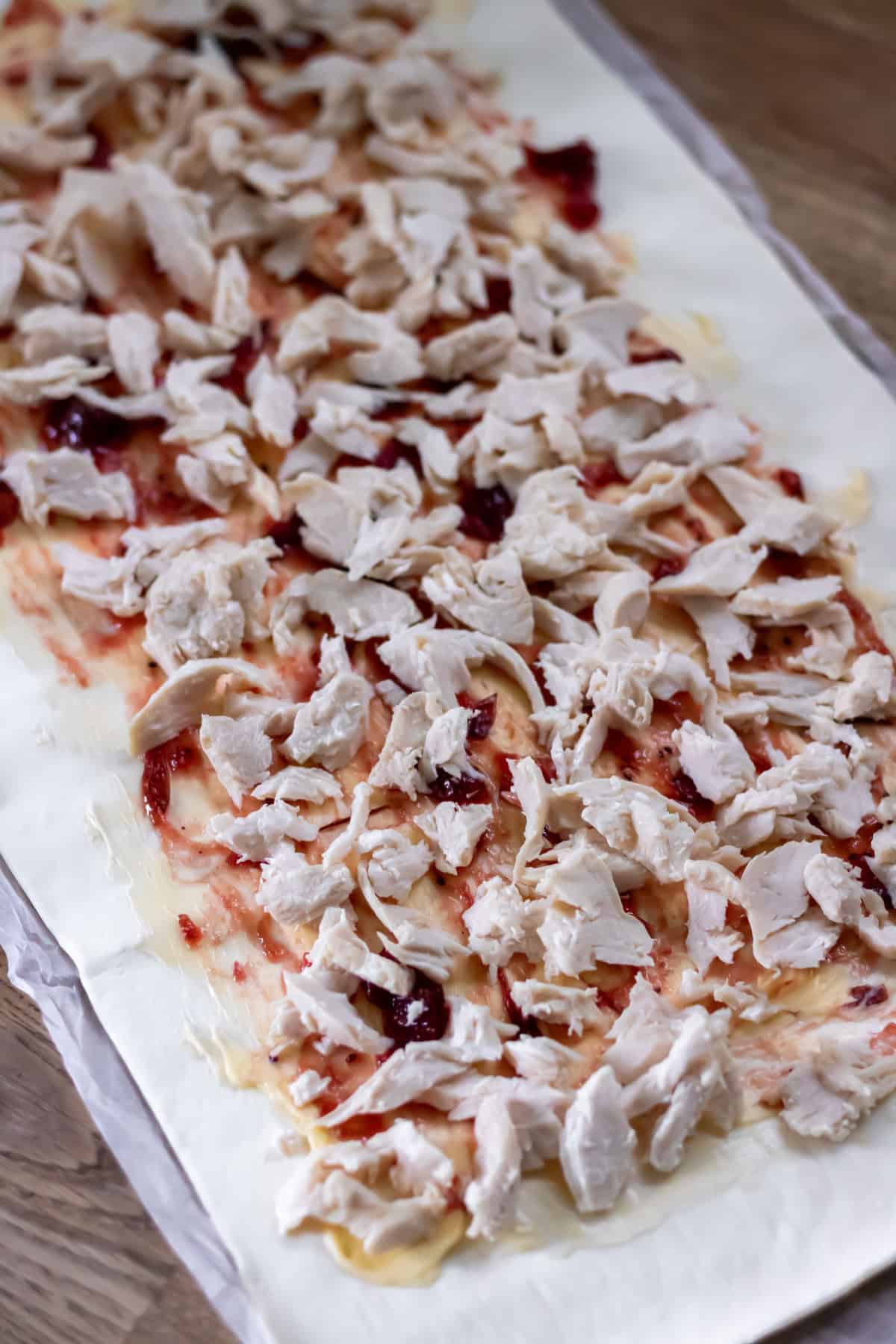 Shredded leftover roasted turkey added to the puff pastry.