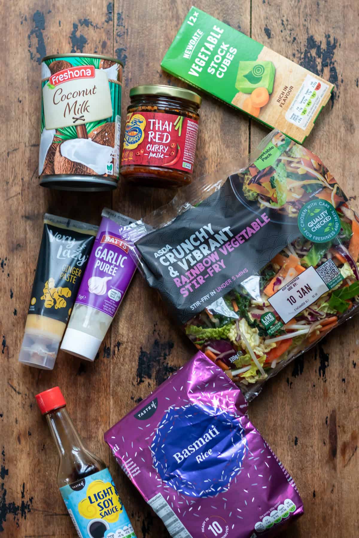 Ingredients for Thai Vegetable Rice Soup on a table.