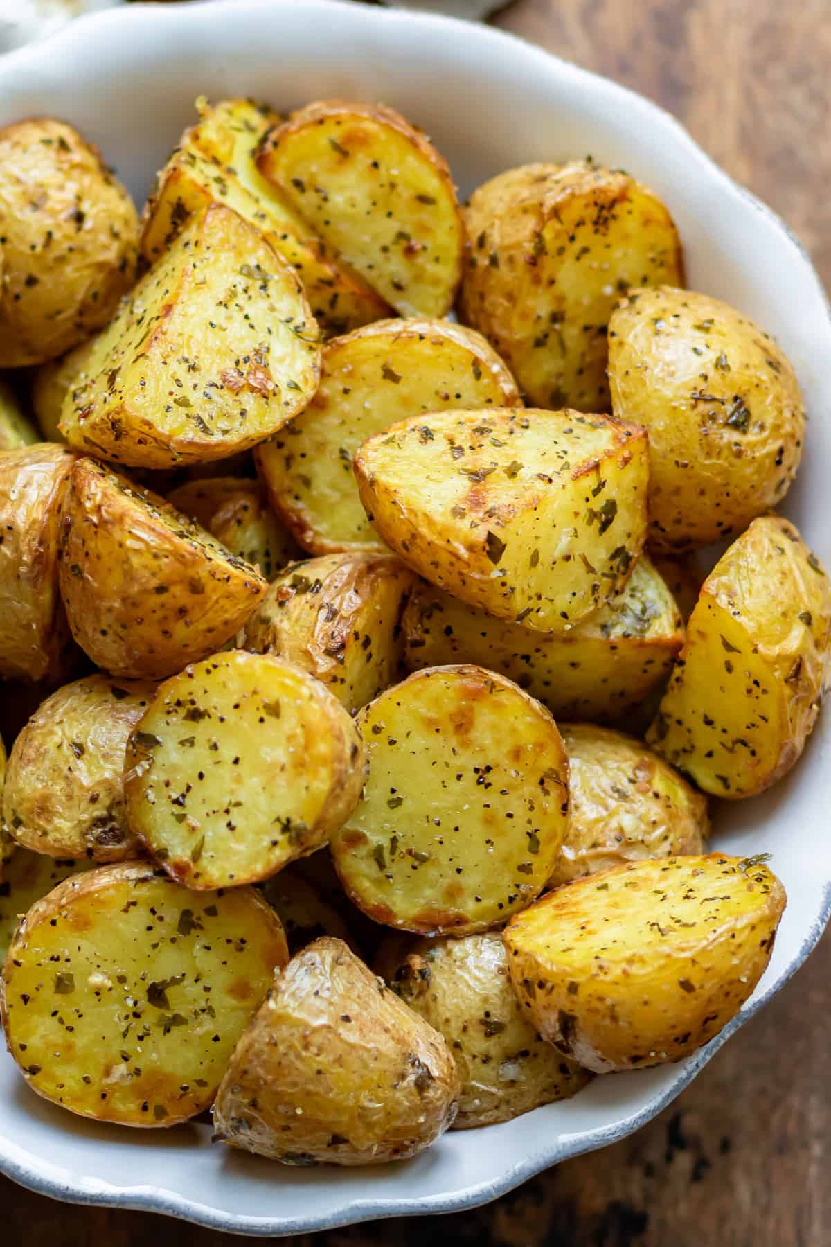 Air fried garlic baby potatoes in a dish.