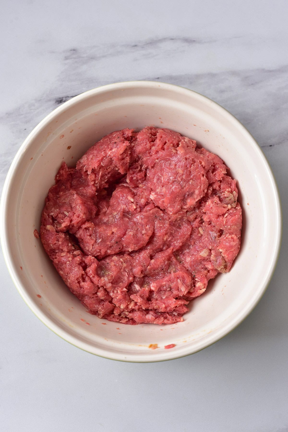 Ground beef in the bowl.