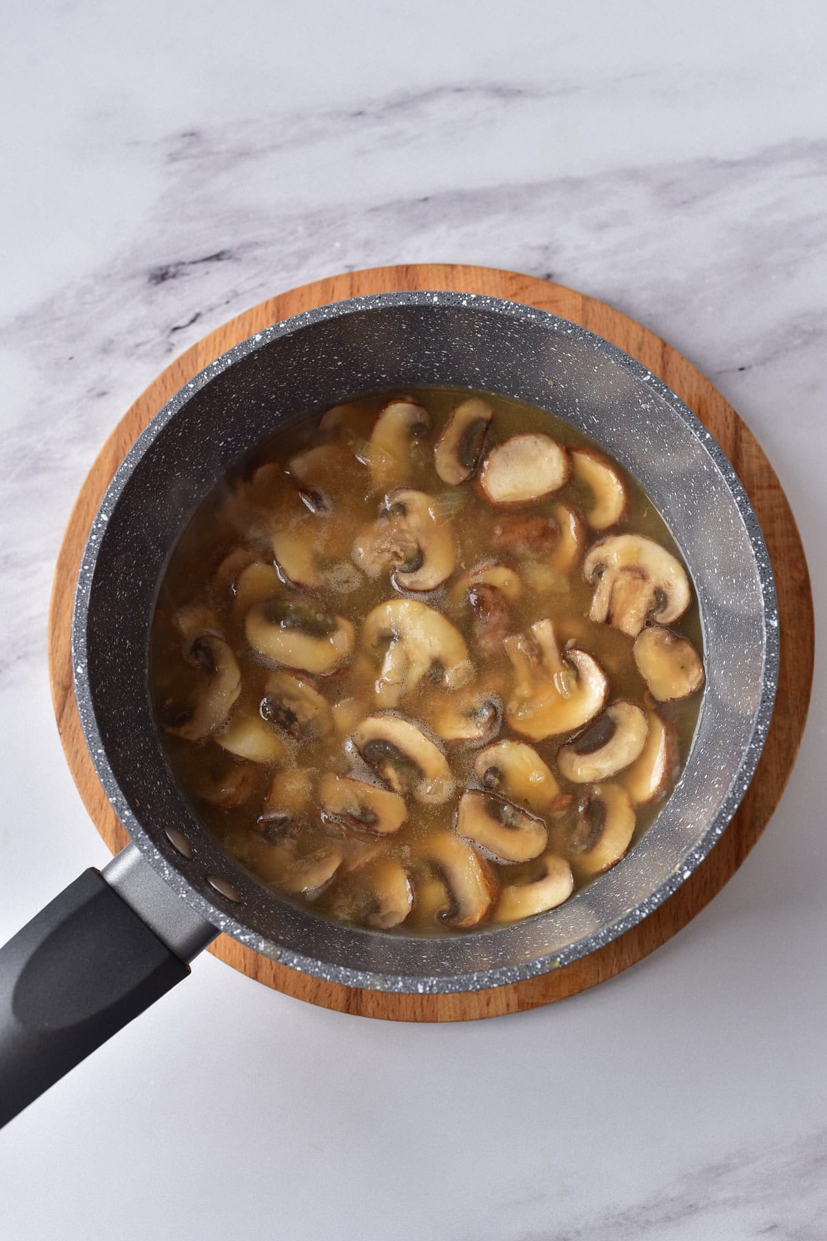 Mushroom gravy in a skillet.