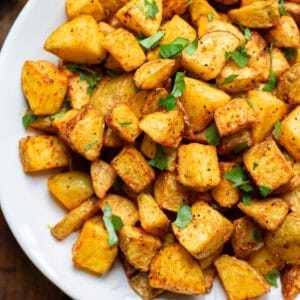 Close up of air fryer diced potatoes.