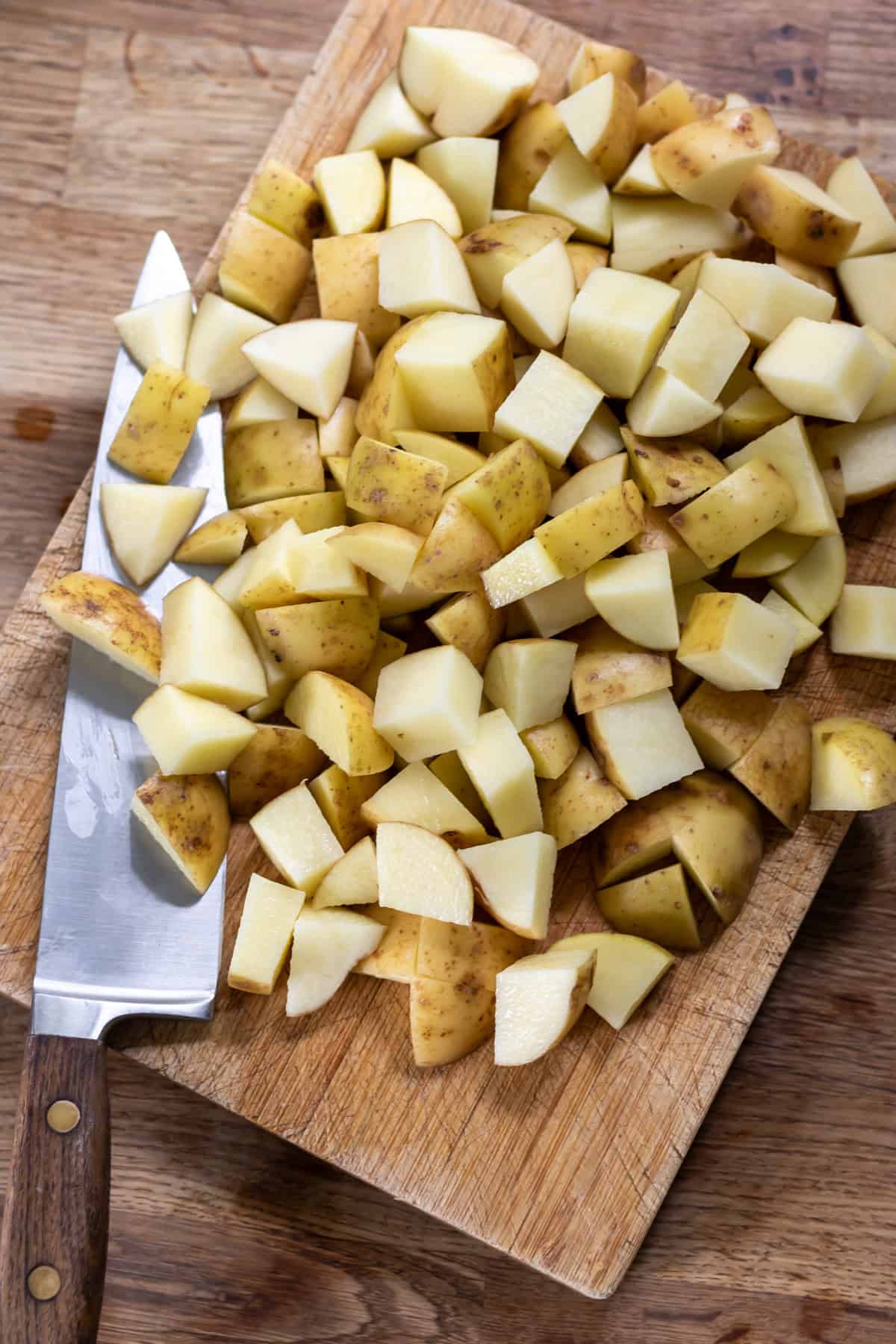 Dicing unpeeled potatoes.