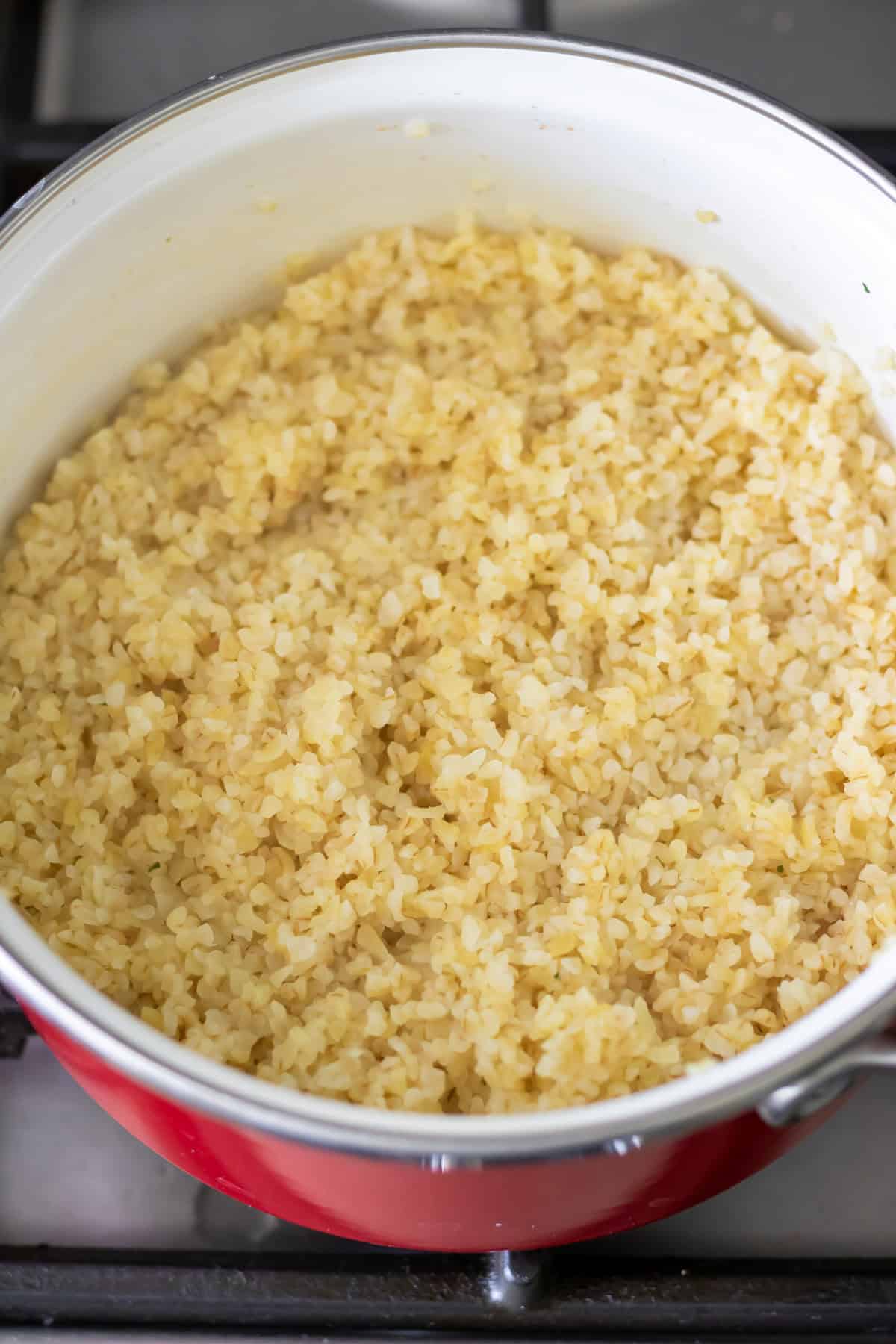 Cooked bulgur wheat in a pot.