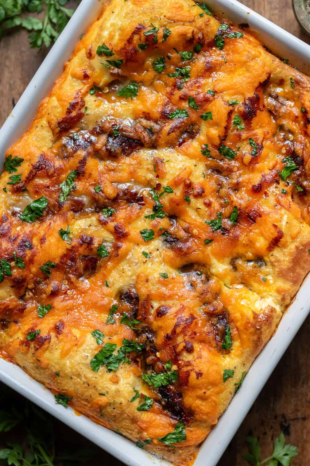 Close up of a baking dish of hot honey sausage breakfast bake.