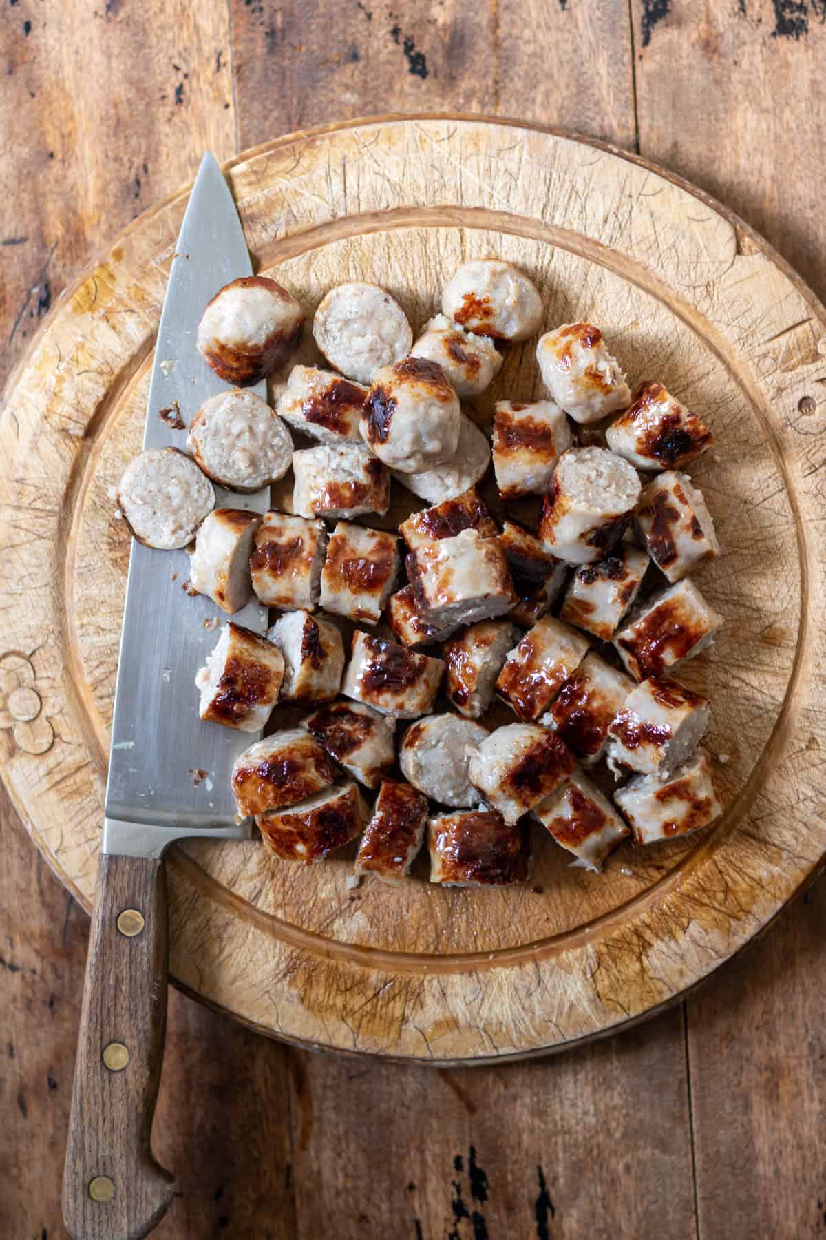 Slicing the cooked sausages.