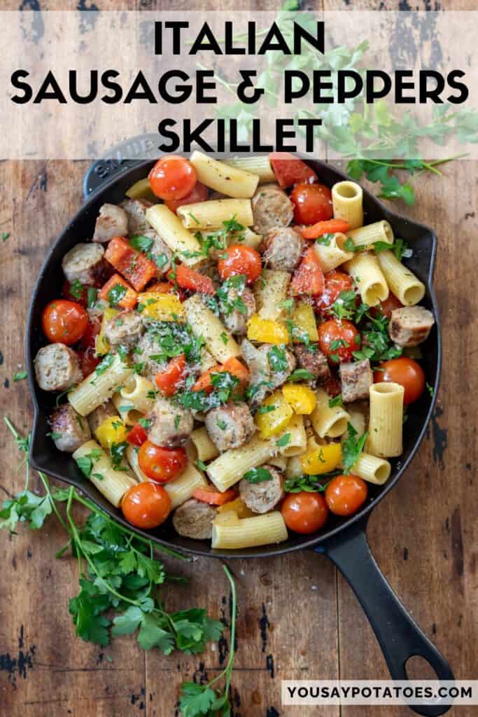 A skillet of sausages, pasta and peppers, with text: Italian Sausage and Peppers Skillet.