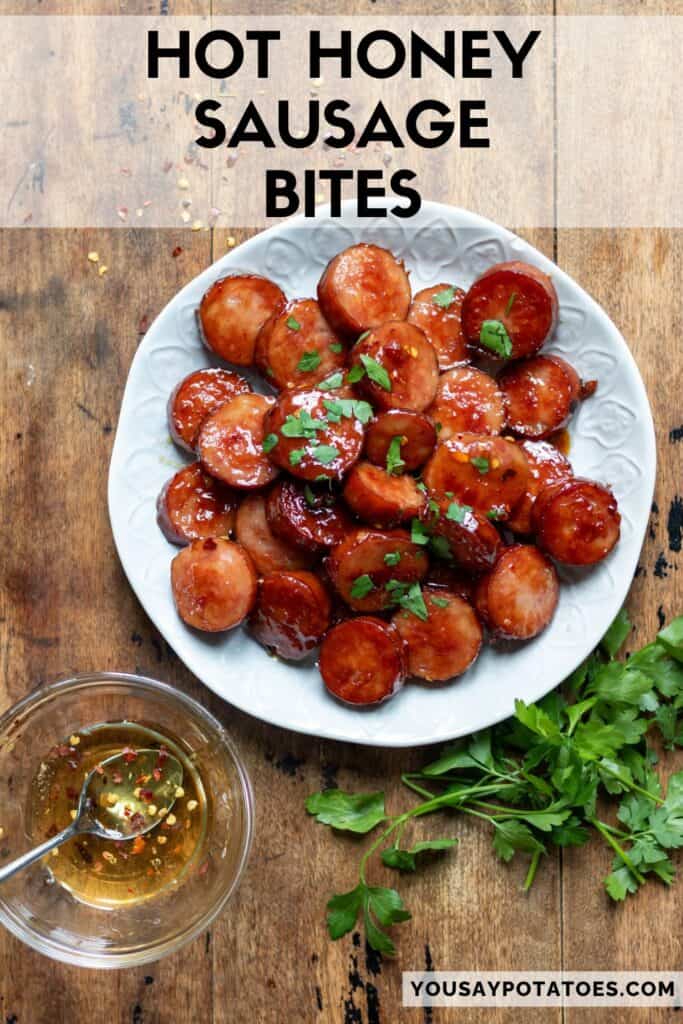 A plate of sausages on a table, with text: Hot Honey Sausage Bites.