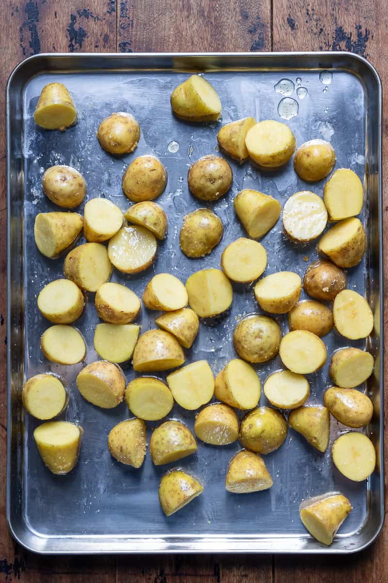 Potatoes on a baking sheet.
